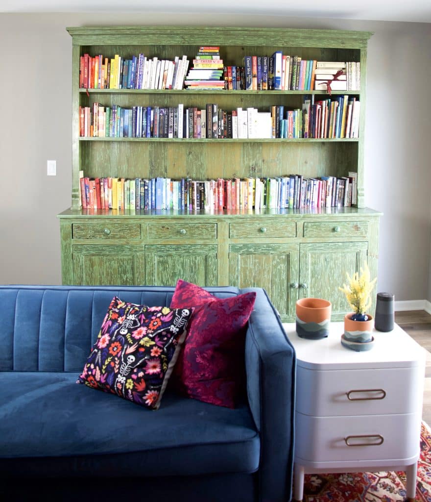 rainbow books on bookshelf