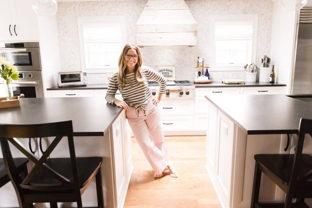 the organized mama in her modern farmhouse kitchen