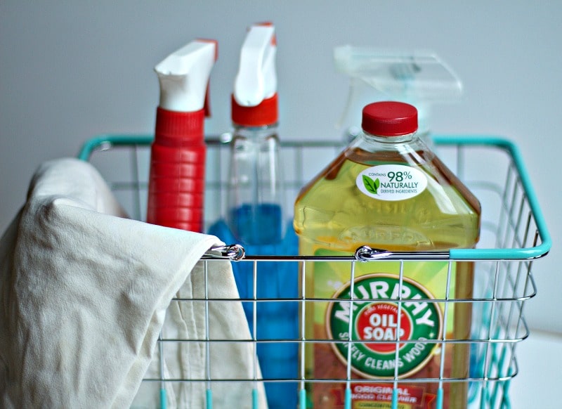 Cleaning products in a wire basket. 