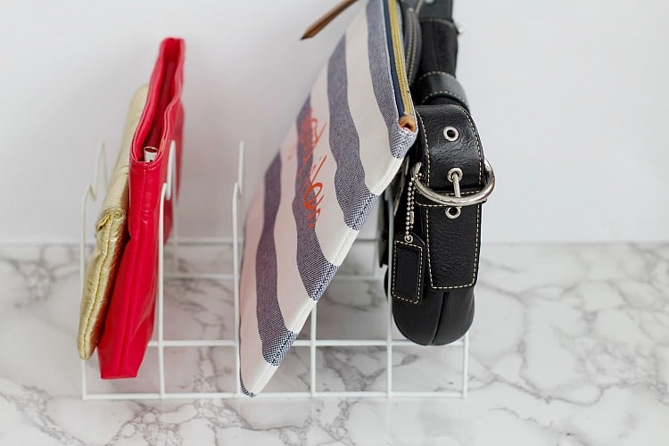 Learn how to get your home organized with items all found at The Dollar Store, with these easy organizing hacks created by professional organizer. Everything from kids clothes to doll accessories to purses to games! #organized #dollarstore