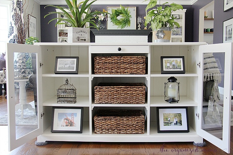 Check out inspiration for creating a modern farmhouse living room. With product links and tips for painting a fireplace, swapping out electrical outlets, and styling the room on a budget, you'll be able to set up your living room easily! #modernfarmhouse #livingroom #orc