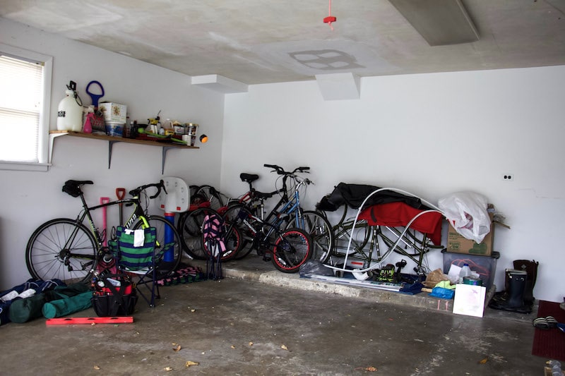 Professional Organizer shares tips on how to utilize space to create garage bike storage that won't break the bank. Plus ideas for bike supply organization. #garageorganization #bikestorage