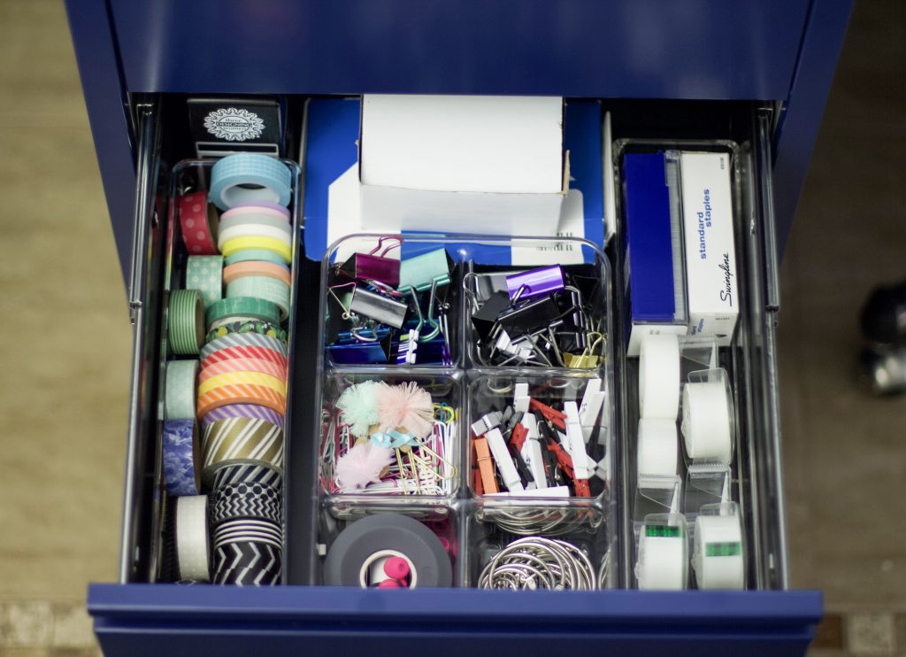 Desk drawer organized using drawer organizers on DIY computer desk that seats 3 people. #drawerorganization #office