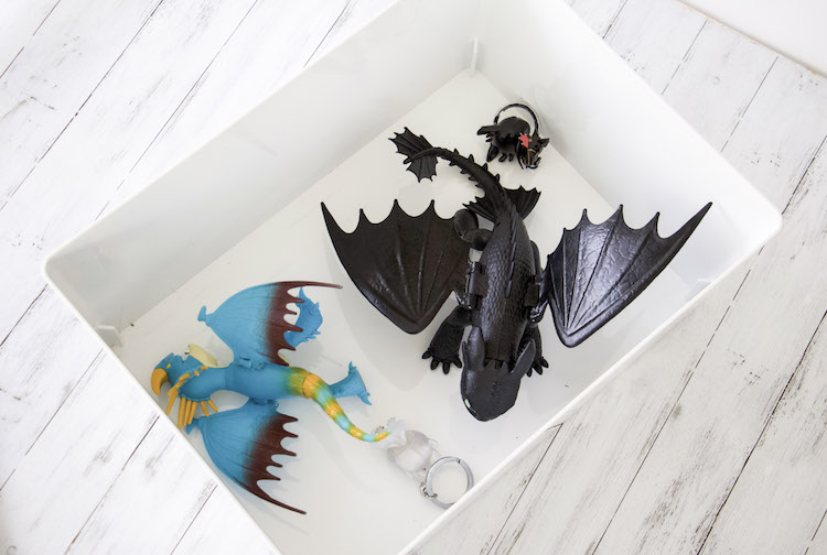 Looking down into a container with dragons from How To Train Your Dragon 3 for easy toy storage