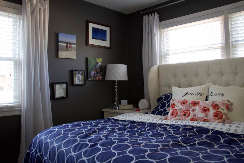 cozy bedroom decor with bed and canvas wall art