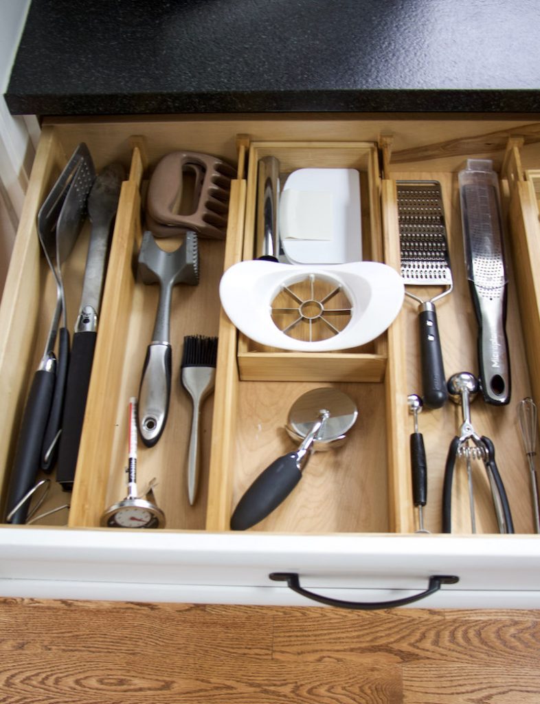 kitchen drawer organized with bamboo drawer dividers and bamboo boxes to keep organized by category #kitchenutensils #organize