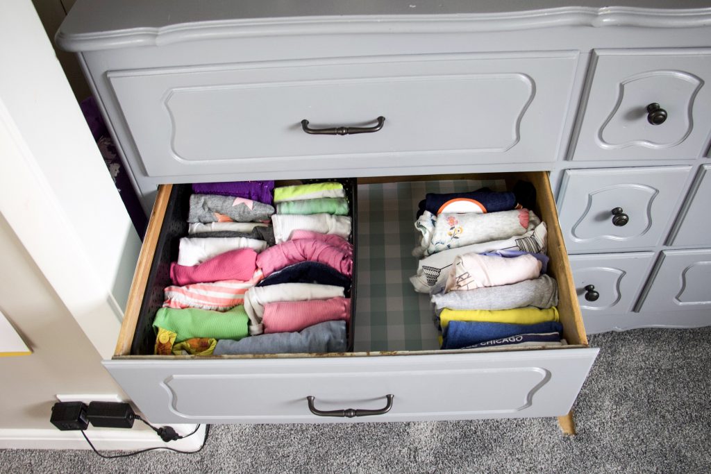 Folded clothes in a dresser drawer #organization #summer