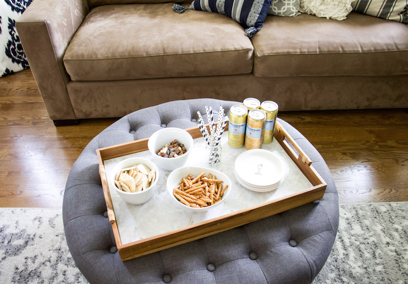 upcycle tray with snacks in front of couch