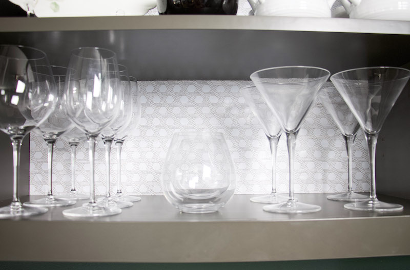 close up of basket weave pattern behind glassware