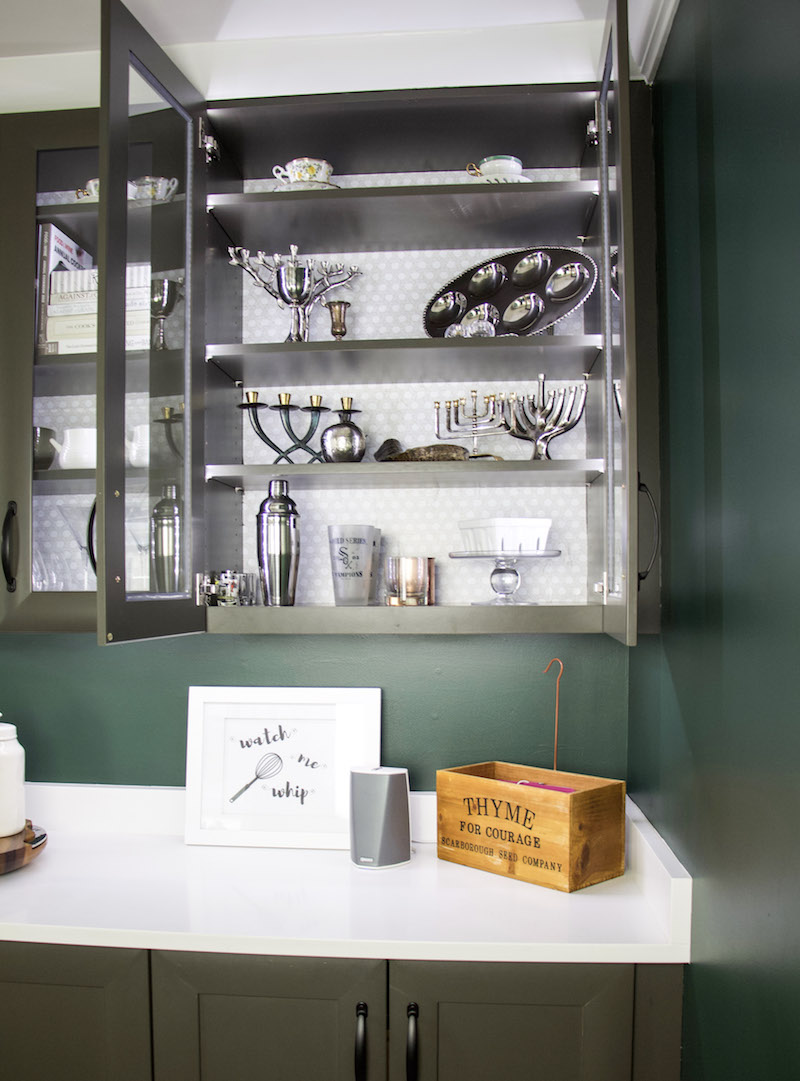judaica in front of basket weave easy liner in kitchen cabinets