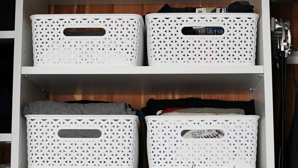 White baskets on shelves to represent organizing my mudroom #organization