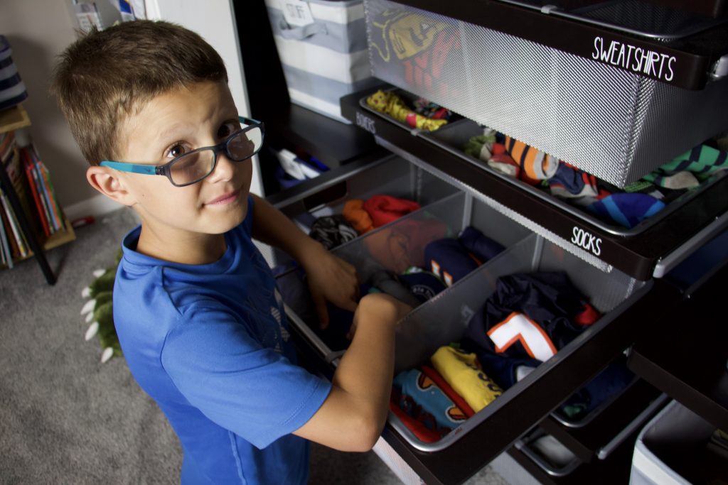 Child clean up as part of his daily routine and schedule for kids #organizedkids