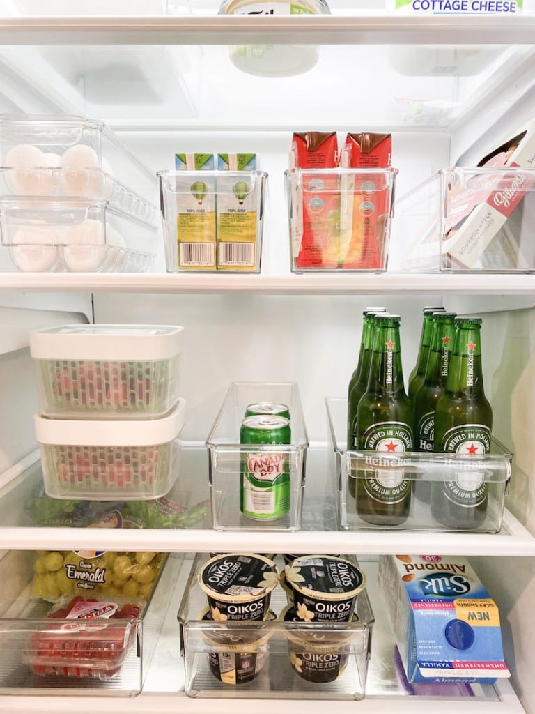 Tidy fridge shelves with clear organizational compartments