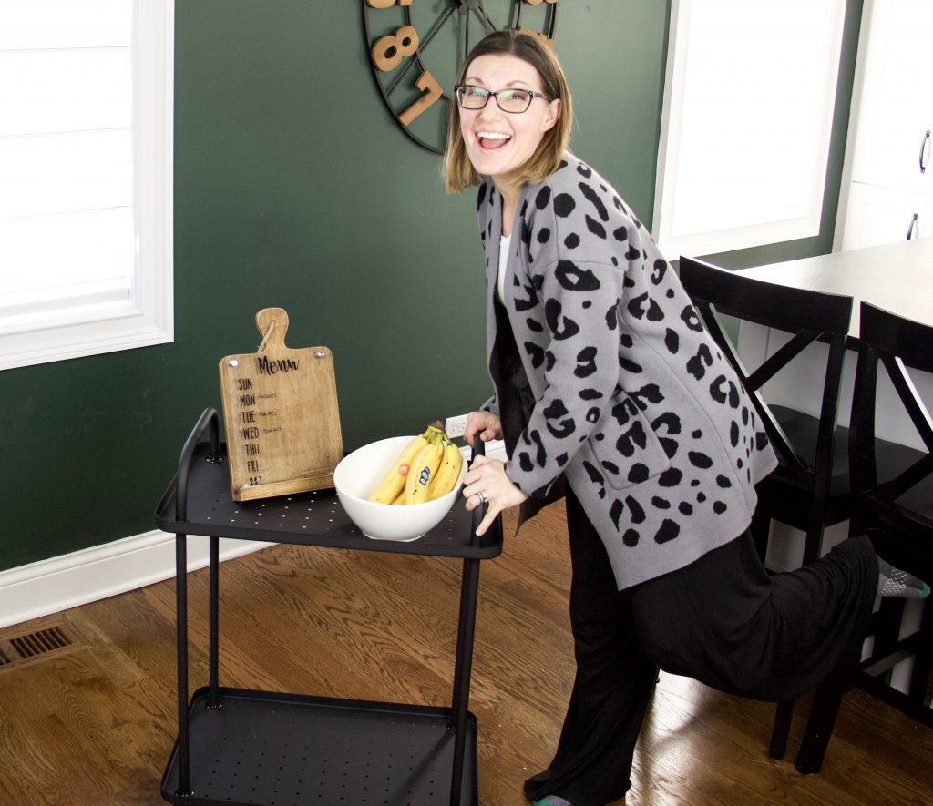 the organized mama pushing a bar cart
