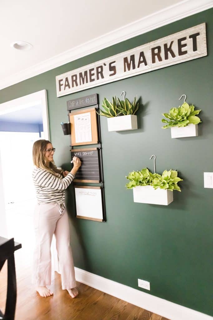 writing down meals on planner