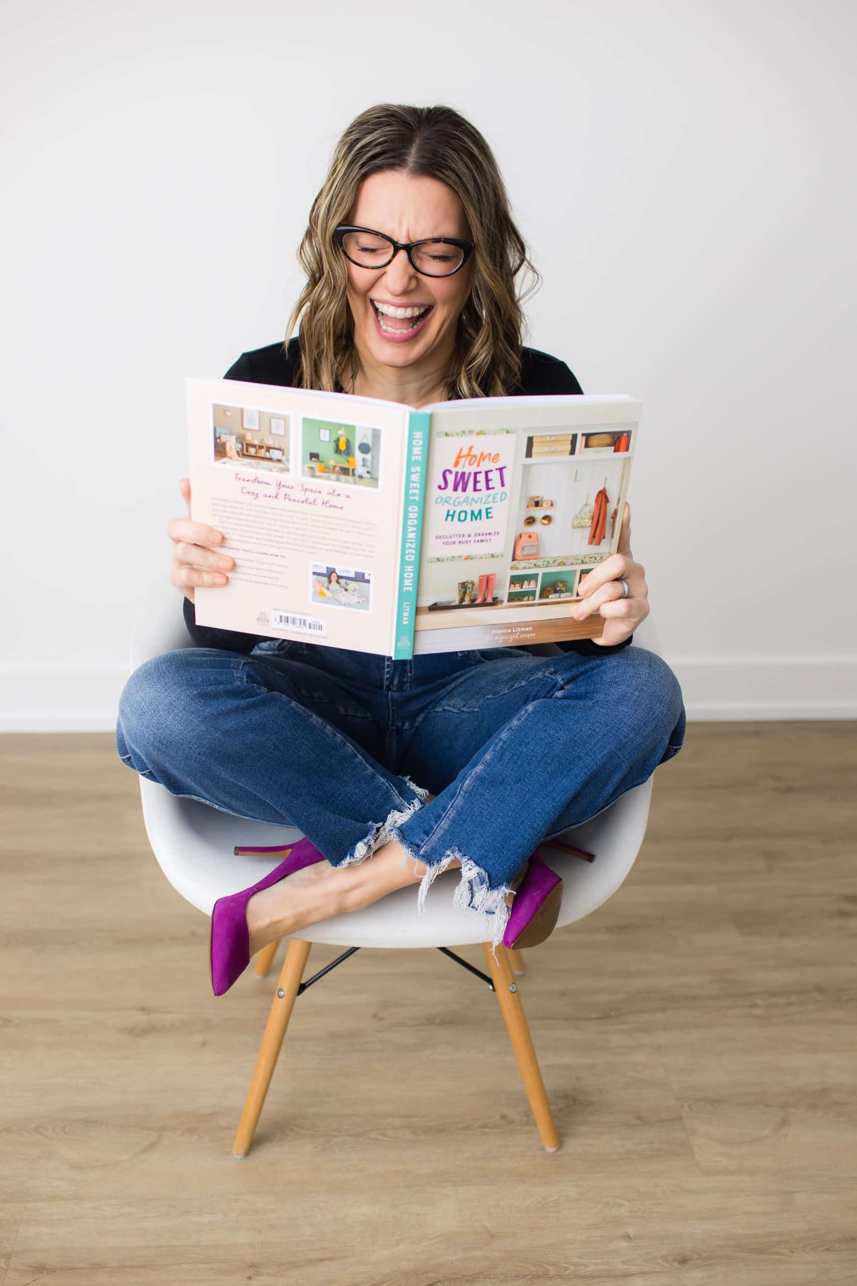 The Organized Mama reading Home Sweet Organized Home book