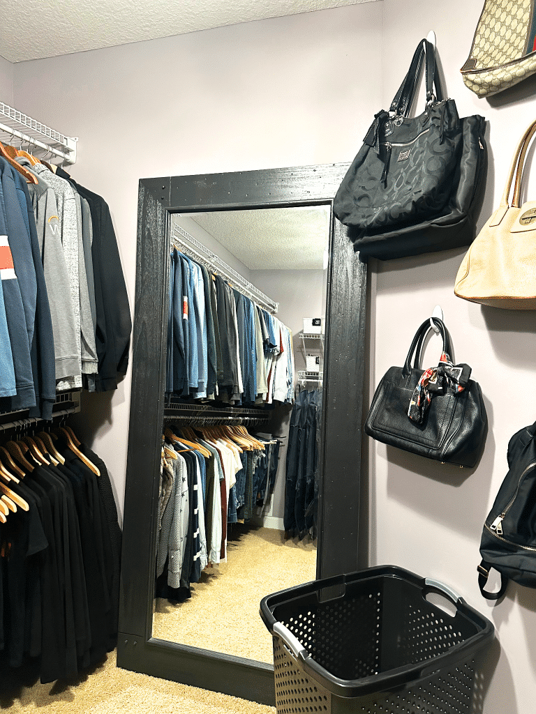 wall with mirror and purses